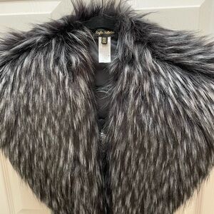 Elegant Faux Fur Scarf in Black and Gray, has clasps for secure closure. Stylish